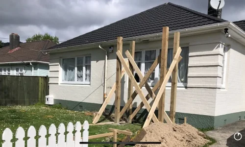 Home renovation in progress with wooden beams for structural support by Renovations Queenstown.