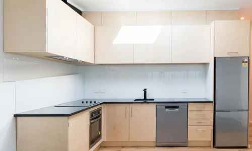 Bright, modern kitchen renovation with wooden flooring by Kitchen Renovations Queenstown.