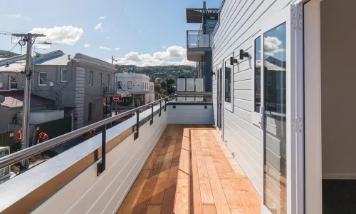 Professionals constructing wooden decks under Builders Queenstown’s Deck Builders Queenstown services.